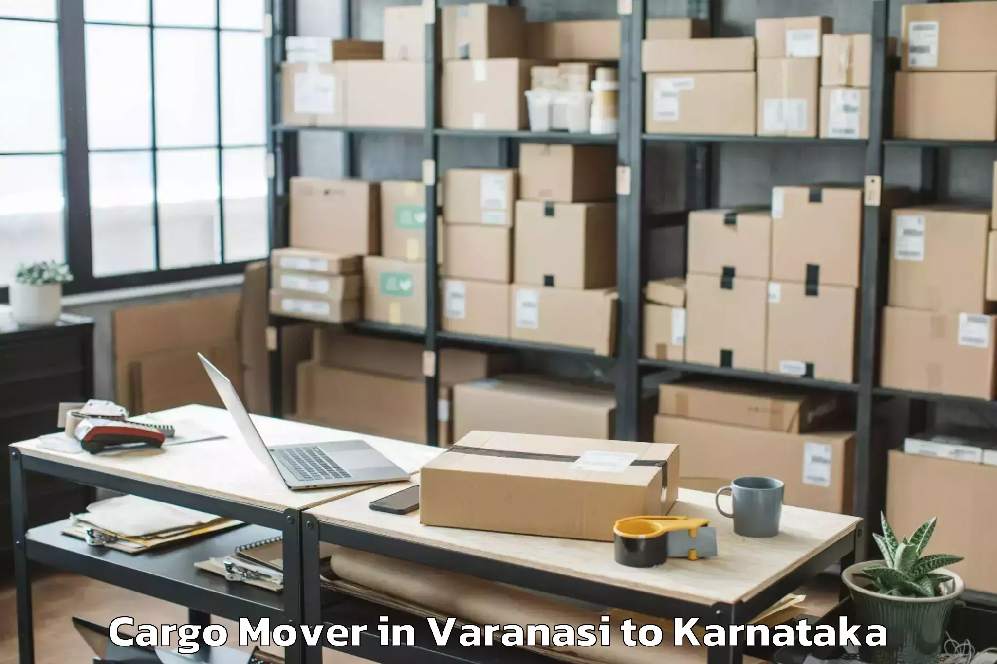 Reliable Varanasi to Karnataka State Law University Cargo Mover